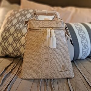 Tote & Carry Creame Cowbell Backpack